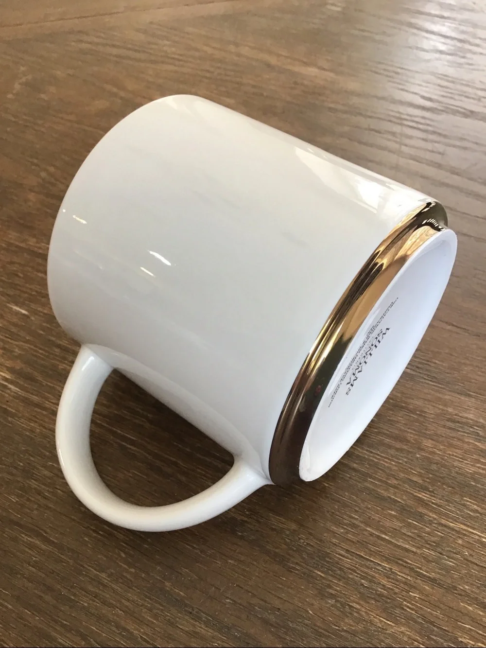 Williams Sonoma white ceramic mug features a gold-painted initial 